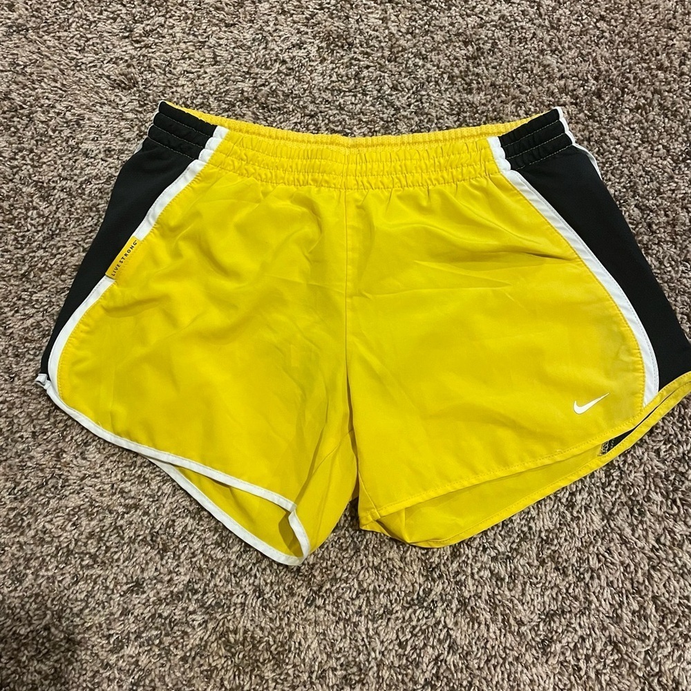 Yellow livestrong Nike shorts